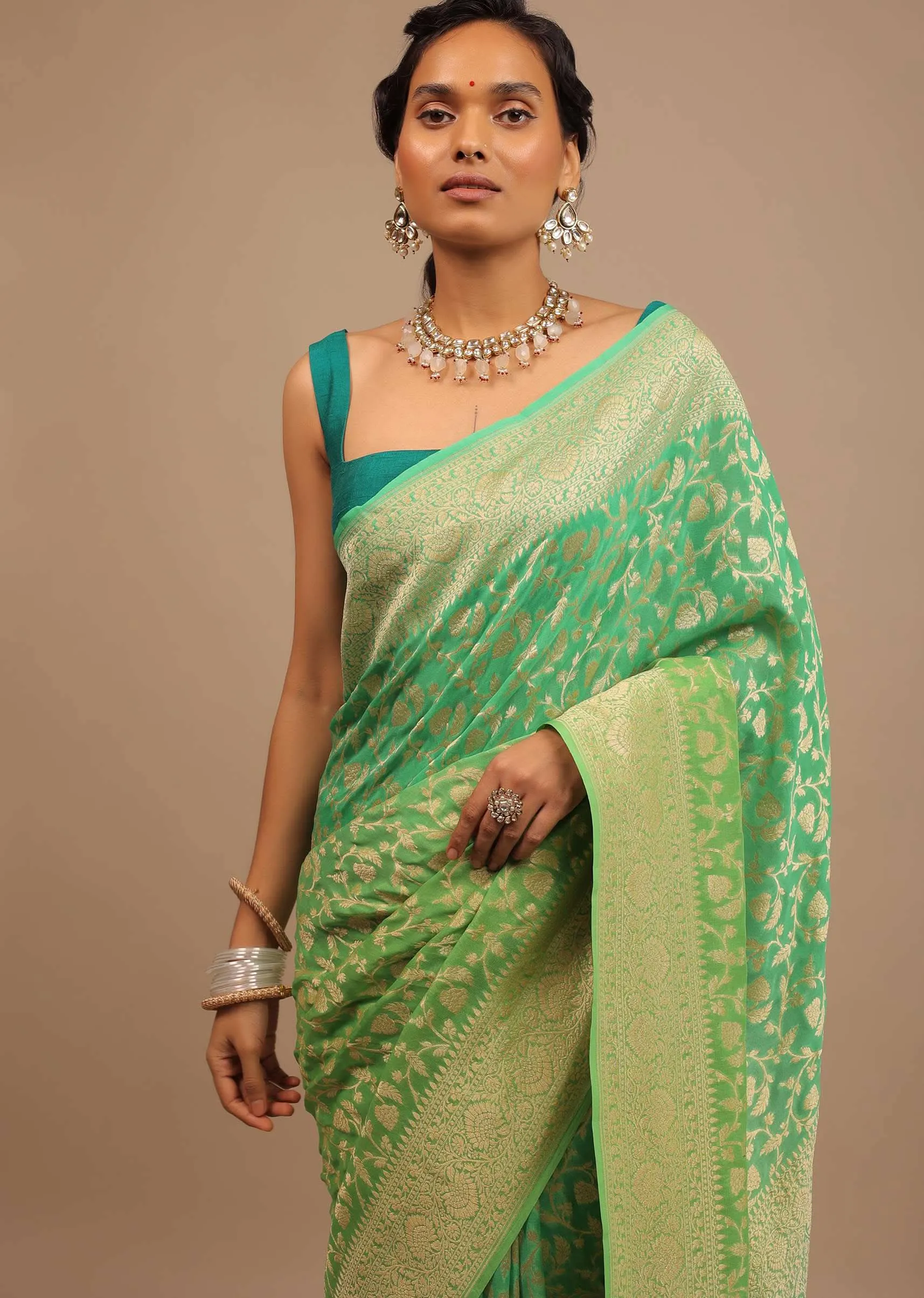 Mint Green Saree With Jaal Work On The Border And Pallu